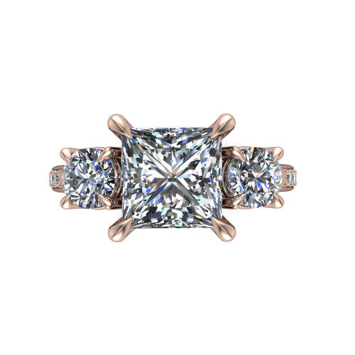Ruth princess three stone engagement ring in 18K Rose Gold, top-down view showing the princess center flanked by two round accent diamonds