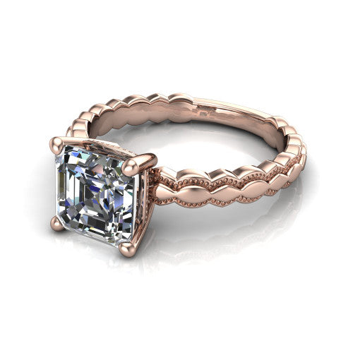 Flora square emerald solitaire engagement ring in 14K Rose Gold, three-quarter perspective showing the square emerald center on claw prongs above a scalloped beaded milgrain band