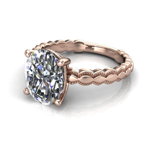 Flora oval solitaire engagement ring in 18K Rose Gold, three-quarter perspective showing the oval center on claw prongs above a scalloped beaded milgrain band
