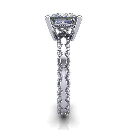Flora princess solitaire engagement ring in 14K White Gold, side profile showing the scalloped milgrain band and the open basket beneath the princess center