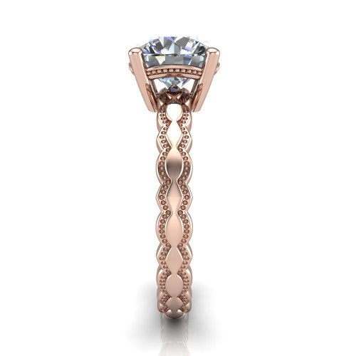 Flora round solitaire engagement ring in 14K Rose Gold, side profile showing the scalloped milgrain band and the open basket beneath the round center