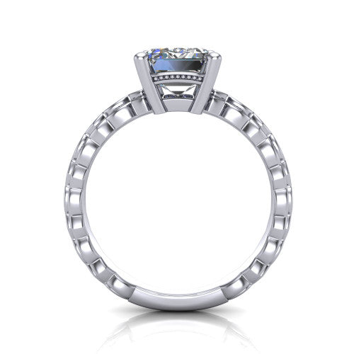 Flora emerald solitaire engagement ring in Platinum, through-finger front profile showing the emerald center raised above the beaded band