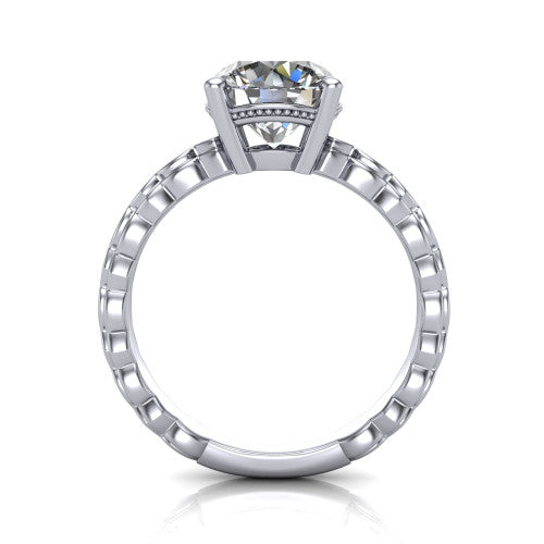 Flora round solitaire engagement ring in Platinum, through-finger front profile showing the round center raised above the beaded band