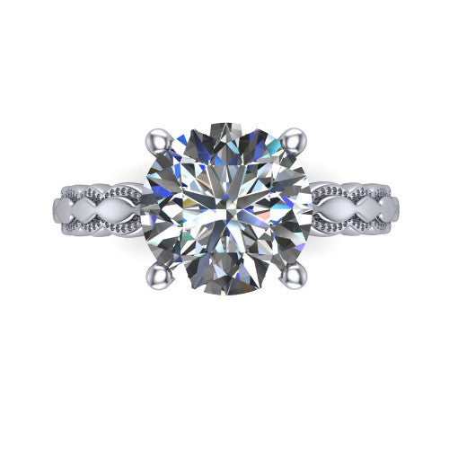 Flora round solitaire engagement ring in Platinum, top-down view showing the round center and the scalloped openwork band