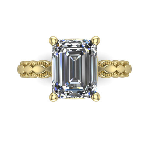 Flora emerald solitaire engagement ring in 18K Yellow Gold, top-down view showing the emerald center and the scalloped openwork band