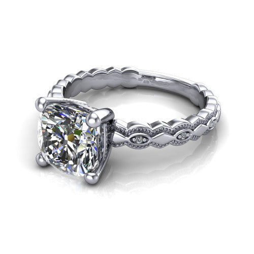 Ivy cushion solitaire engagement ring in Platinum, three-quarter perspective showing the solitaire center diamond above a vintage marquise-and-dot milgrain band