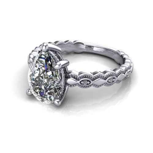 Ivy pear solitaire engagement ring in 18K White Gold, three-quarter perspective showing the solitaire center diamond above a vintage marquise-and-dot milgrain band