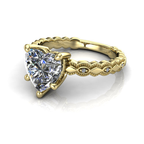 Ivy heart solitaire engagement ring in 14K Yellow Gold, three-quarter perspective showing the solitaire center diamond above a vintage marquise-and-dot milgrain band
