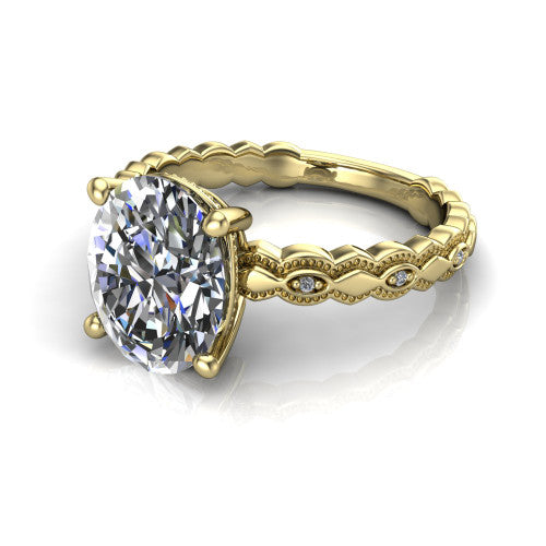 Ivy oval solitaire engagement ring in 14K Yellow Gold, three-quarter perspective showing the solitaire center diamond above a vintage marquise-and-dot milgrain band