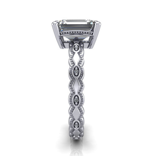 Ivy emerald solitaire engagement ring in 14K White Gold, side profile showing the milgrain marquise shapes and bezel-set round accents around the shank