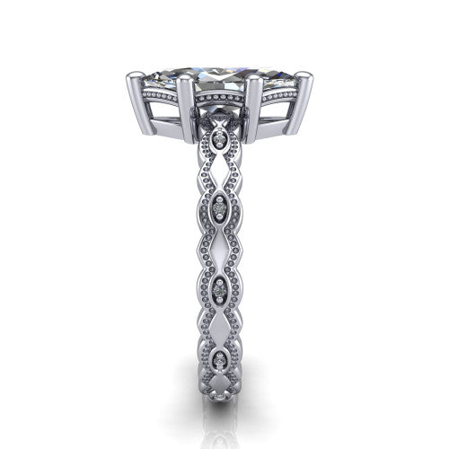 Ivy marquise solitaire engagement ring in Platinum, side profile showing the milgrain marquise shapes and bezel-set round accents around the shank