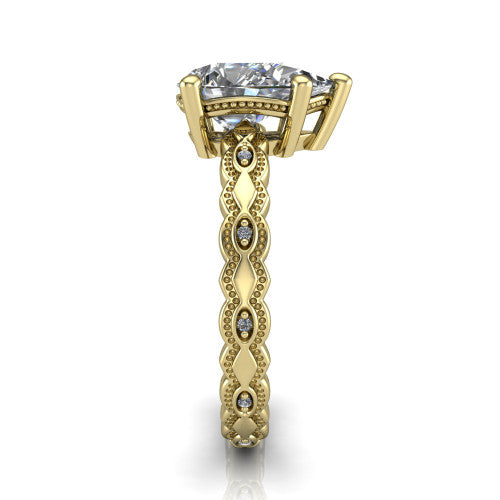 Ivy pear solitaire engagement ring in 18K Yellow Gold, side profile showing the milgrain marquise shapes and bezel-set round accents around the shank