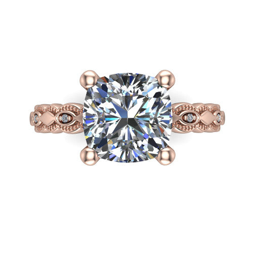 Ivy cushion solitaire engagement ring in 14K Rose Gold, top-down view showing the prong-set center diamond over a patterned milgrain eternity band