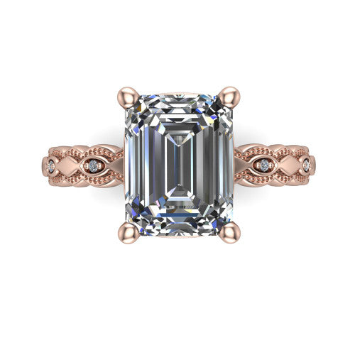 Ivy emerald solitaire engagement ring in 14K Rose Gold, top-down view showing the prong-set center diamond over a patterned milgrain eternity band