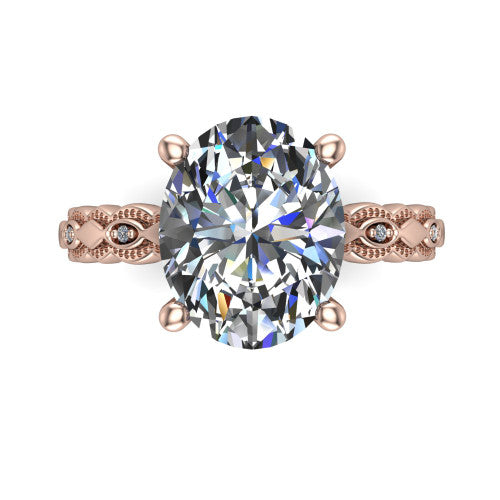 Ivy oval solitaire engagement ring in 14K Rose Gold, top-down view showing the prong-set center diamond over a patterned milgrain eternity band