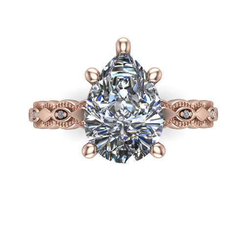 Ivy pear solitaire engagement ring in 18K Rose Gold, top-down view showing the prong-set center diamond over a patterned milgrain eternity band