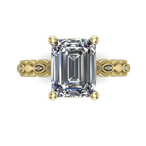 Ivy emerald solitaire engagement ring in 14K Yellow Gold, top-down view showing the prong-set center diamond over a patterned milgrain eternity band