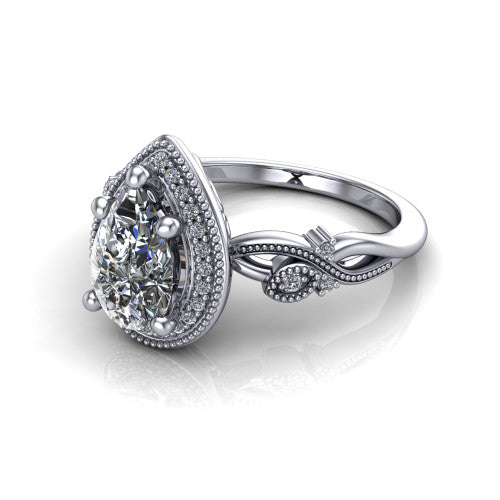 Eliana pear halo engagement ring in Platinum, three-quarter perspective showing the milgrain-edged halo center above vintage filigree scroll shoulders