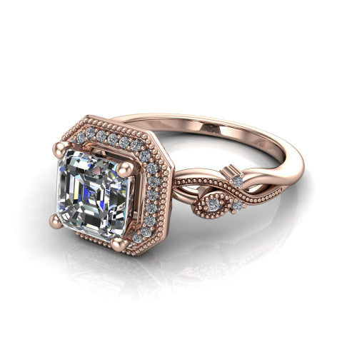 Eliana asscher halo engagement ring in 14K Rose Gold, three-quarter perspective showing the milgrain-edged halo center above vintage filigree scroll shoulders