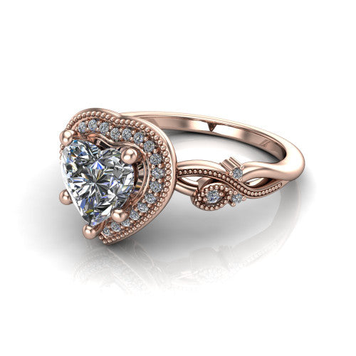 Eliana heart halo engagement ring in 18K Rose Gold, three-quarter perspective showing the milgrain-edged halo center above vintage filigree scroll shoulders