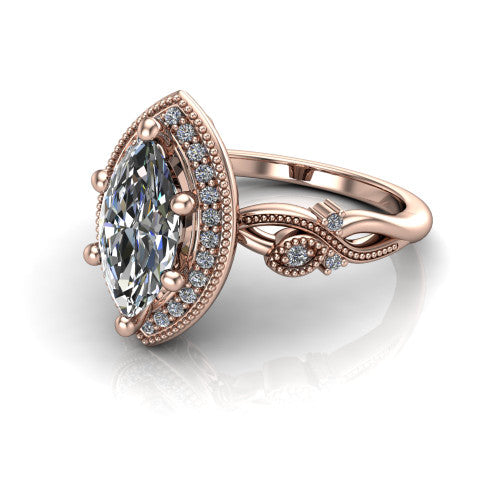 Eliana marquise halo engagement ring in 14K Rose Gold, three-quarter perspective showing the milgrain-edged halo center above vintage filigree scroll shoulders