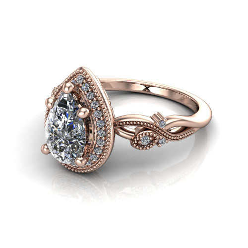 Eliana pear halo engagement ring in 14K Rose Gold, three-quarter perspective showing the milgrain-edged halo center above vintage filigree scroll shoulders