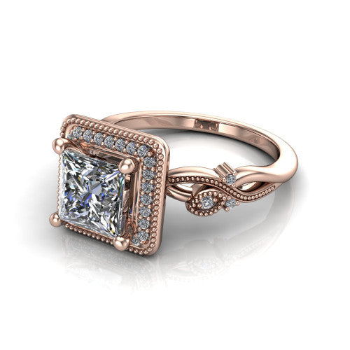 Eliana princess halo engagement ring in 18K Rose Gold, three-quarter perspective showing the milgrain-edged halo center above vintage filigree scroll shoulders