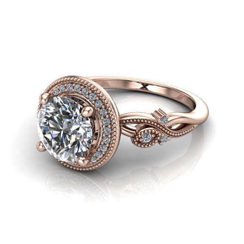 Eliana round halo engagement ring in 18K Rose Gold, three-quarter perspective showing the milgrain-edged halo center above vintage filigree scroll shoulders