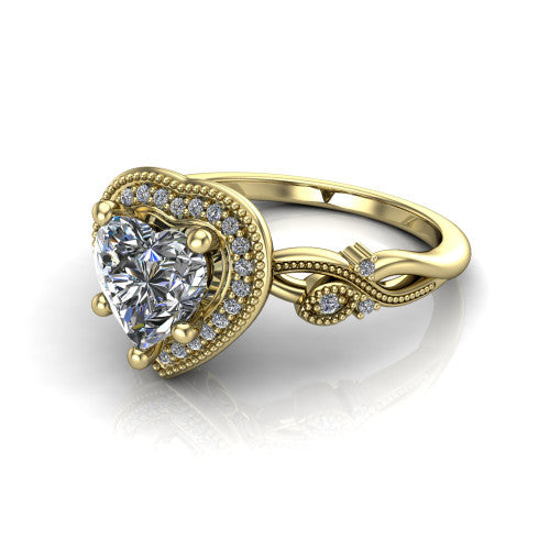 Eliana heart halo engagement ring in 18K Yellow Gold, three-quarter perspective showing the milgrain-edged halo center above vintage filigree scroll shoulders