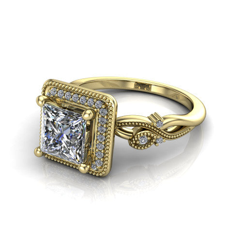 Eliana princess halo engagement ring in 18K Yellow Gold, three-quarter perspective showing the milgrain-edged halo center above vintage filigree scroll shoulders