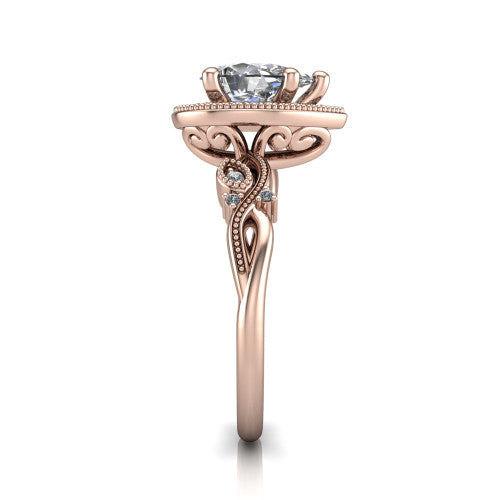 Eliana pear halo engagement ring in 18K Rose Gold, side profile showing the open filigree scrollwork along the shoulders of the band