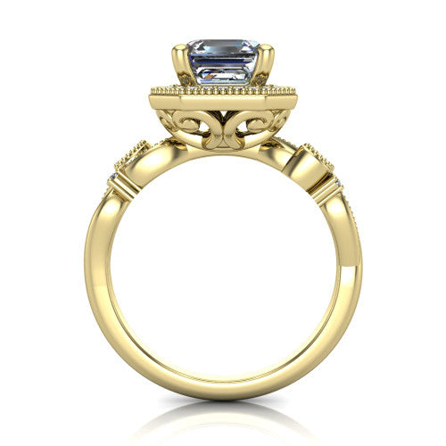 Eliana emerald halo engagement ring in 18K Yellow Gold, through-finger front profile showing the halo head raised above the filigree scroll shoulders