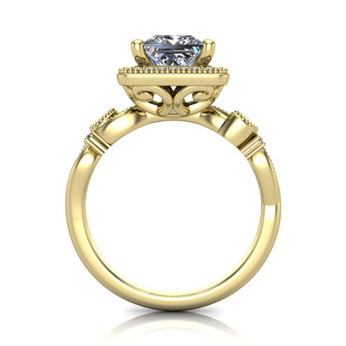 Eliana princess halo engagement ring in 18K Yellow Gold, through-finger front profile showing the halo head raised above the filigree scroll shoulders