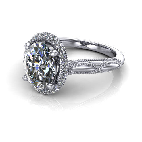 Caroline oval vintage halo engagement ring in 14K White Gold, three-quarter perspective showing the oval center in a squared pav&eacute; milgrain halo above an openwork split shank