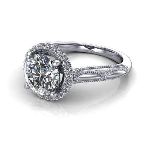 Caroline round vintage halo engagement ring in Platinum, three-quarter perspective showing the round center in a squared pav&eacute; milgrain halo above an openwork split shank