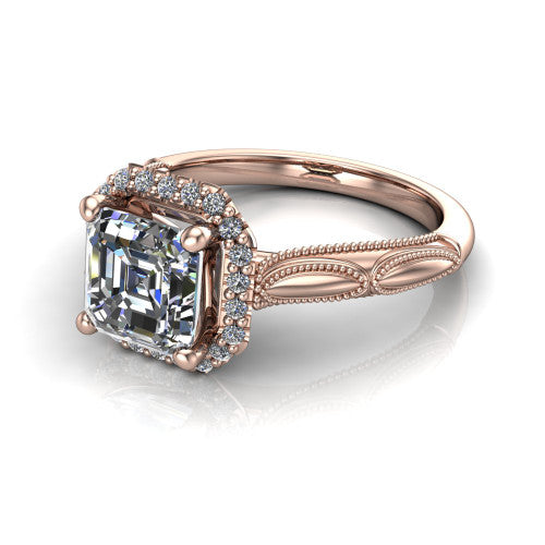 Caroline square emerald vintage halo engagement ring in 18K Rose Gold, three-quarter perspective showing the square emerald center in a squared pav&eacute; milgrain halo above an openwork split shank