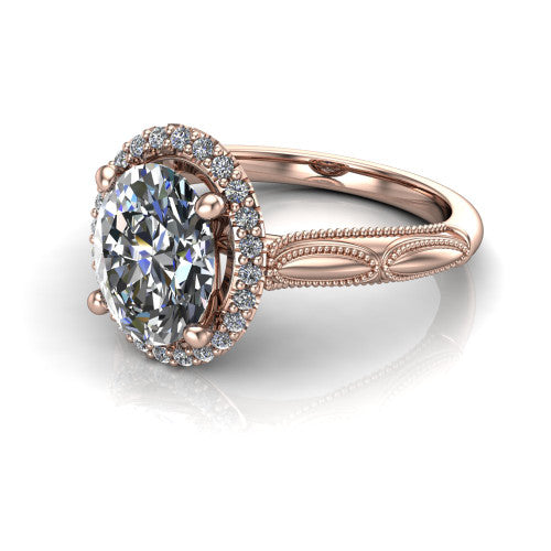 Caroline oval vintage halo engagement ring in 14K Rose Gold, three-quarter perspective showing the oval center in a squared pav&eacute; milgrain halo above an openwork split shank