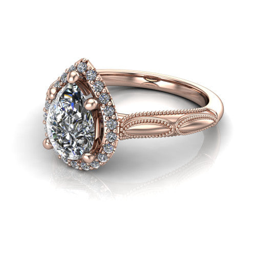 Caroline pear vintage halo engagement ring in 14K Rose Gold, three-quarter perspective showing the pear center in a squared pav&eacute; milgrain halo above an openwork split shank
