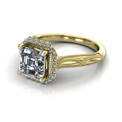 Caroline square emerald vintage halo engagement ring in 18K Yellow Gold, three-quarter perspective showing the square emerald center in a squared pav&eacute; milgrain halo above an openwork split shank