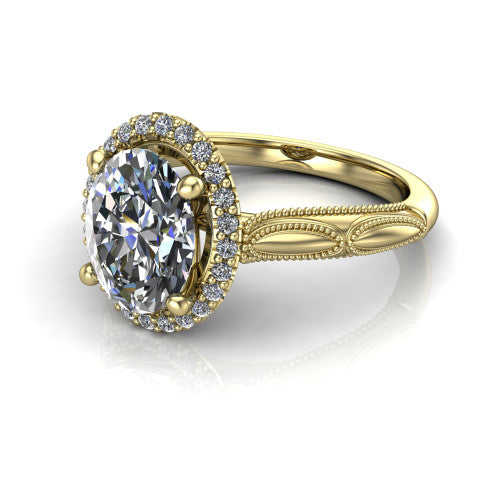 Caroline oval vintage halo engagement ring in 18K Yellow Gold, three-quarter perspective showing the oval center in a squared pav&eacute; milgrain halo above an openwork split shank