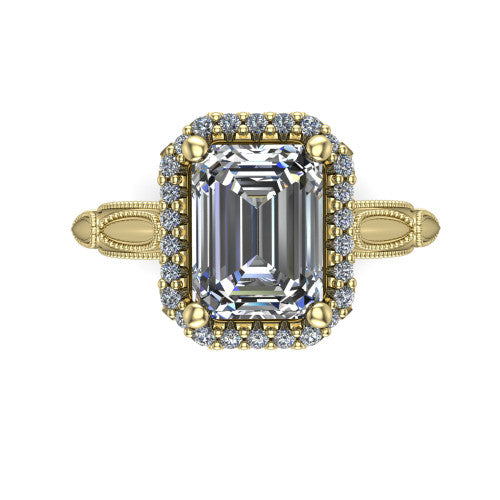 Caroline emerald vintage halo engagement ring in 18K Yellow Gold, top-down view showing the squared pav&eacute; halo framing the emerald center with milgrain edges