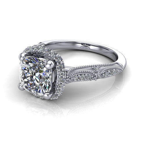 Jenna cushion vintage halo engagement ring in Platinum, three-quarter perspective showing the cushion center in a squared pav&eacute; milgrain halo above a pav&eacute; band