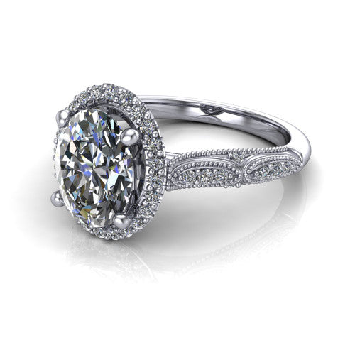 Jenna oval vintage halo engagement ring in 14K White Gold, three-quarter perspective showing the oval center in a squared pav&eacute; milgrain halo above a pav&eacute; band