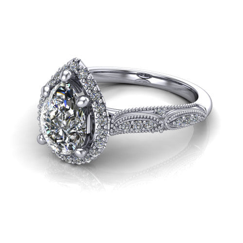Jenna pear vintage halo engagement ring in 14K White Gold, three-quarter perspective showing the pear center in a squared pav&eacute; milgrain halo above a pav&eacute; band