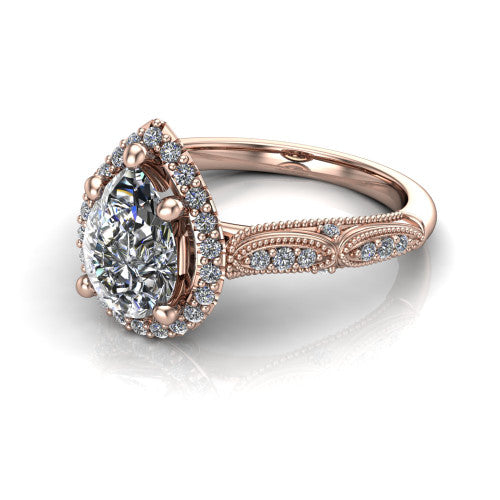 Jenna pear vintage halo engagement ring in 14K Rose Gold, three-quarter perspective showing the pear center in a squared pav&eacute; milgrain halo above a pav&eacute; band
