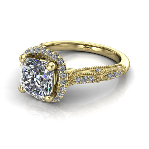 Jenna cushion vintage halo engagement ring in 18K Yellow Gold, three-quarter perspective showing the cushion center in a squared pav&eacute; milgrain halo above a pav&eacute; band