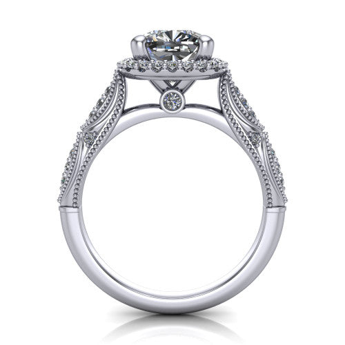 Jenna cushion vintage halo engagement ring in Platinum, through-finger front profile showing the halo head and milgrain gallery with a bezel accent above the pav&eacute; band