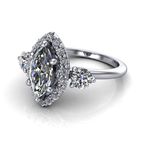 Carol marquise three stone halo engagement ring in 18K White Gold, three-quarter perspective showing the marquise center in a squared pav&eacute; halo flanked by two round side stones above a plain band