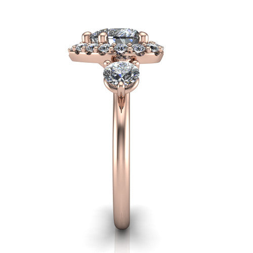 Carol heart three stone halo engagement ring in 14K Rose Gold, side profile showing the plain polished band and the three-stone halo head in profile