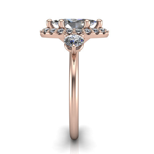 Carol marquise three stone halo engagement ring in 18K Rose Gold, side profile showing the plain polished band and the three-stone halo head in profile